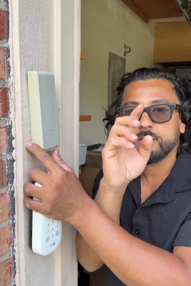 Small creator demonstrating a smart-home keypad